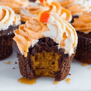 Chocolate Pumpkin Cupcakes with Salted Caramel Buttercream are a delicious new way to enjoy pumpkin desserts this holiday season! Great for Halloween and fall parties! #halloween #pumpkin #chocolate #saltedcaramel #cupcakes #dessert